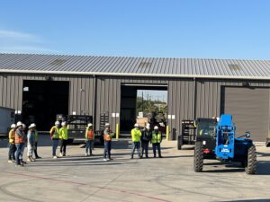 Mark Alvarez (far right) trains BCS Operators on the Rough Terrain Forklift for fall training at bcs