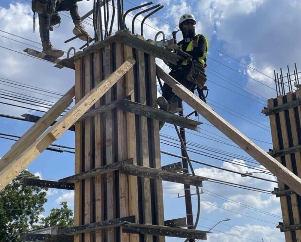 Workers on Column Form at North Loop North Lamar Project from BCS Austin