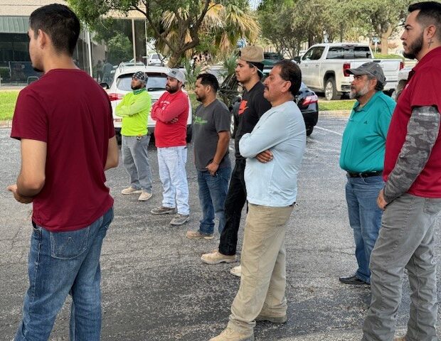 Workers Watching FallTech Drop Truck Demonstrations