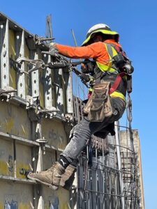 BCS Worker Wearing PPE and Fall Protection