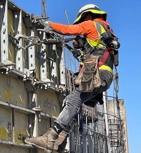 BCS Worker Wearing PPE and Fall Protection