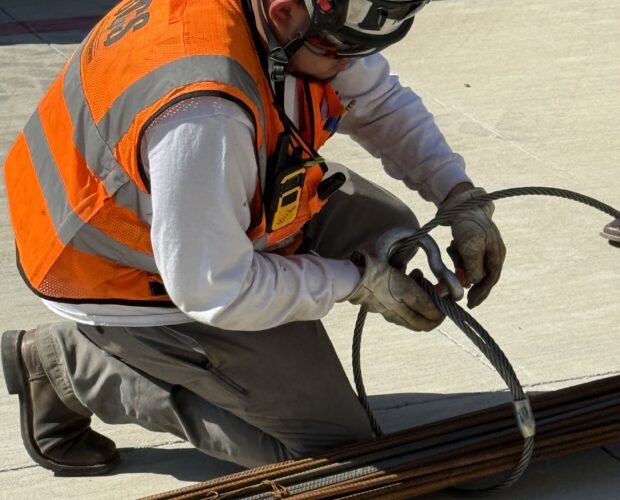 A Trainee Prepares Rigging for Inspection