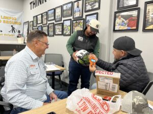 Pat Walsh, Beto Garcia and Jonathan Cardoza with Watermelon for Ladder Safety Station